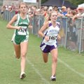 Fayetteville's Maggie Pickhardt, right, out sprints Van Buren's Ashley Myers at the finish line of
...