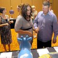 <b>Hannah's Hope</b>
Shannon and Robert Owens of Gentry looked through silent auction items at the ...