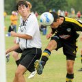 Cesar Merlos, with the five-time state champion Northwest Arkansas Lightning U18 Strikers, headed a ...
