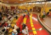 Joey Folsom, principal of Butterfield Trail Elementary School, speaks in the cafeteria during a dedication ceremony Sunday at the newly remodeled school.