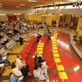 Joey Folsom, principal of Butterfield Trail Elementary School, speaks in the cafeteria during a dedi...