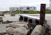 An empty slab sits last month where a house once stood in Crystal Beach, Texas, one year after Hurricane Ike slammed into the Texas coast.