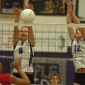 Fayetteville junior Morgan Cosby (8) and senior Sarah Pfitzinger (12) reach to block a kill by Fort ...
