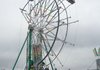 Employees of Archway Amusements erecting the ferris wheel on Monday from the late Michael Jackson's Neverland at the Baxter County Fairgrounds in Mountain Home. The fair opens Tuesday evening and runs through Saturday.