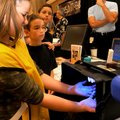 <b>A hand-washing lesson</b>
Storm Airoso, 12, rubbed simulated bacteria on her hands, then looked ...