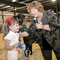 Hailey Harris, 4, of Gravette received the Best of Show ribbon from judge Annette Maze in the Junior...