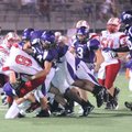 Fayetteville senior linebacker Gareth Booth (84) tackles Jefferson City junior quarterback Sam Turne...