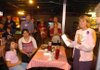 Missy Kincaid, right, co-chairwoman of the A Stronger Fayetteville campaign, talks to a disappointed crowd Tuesday at U.S. Pizza in Fayetteville after voters failed to pass a county property tax millage increase to build a new high school. 