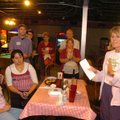 Missy Kincaid, right, co-chairwoman of the A Stronger Fayetteville campaign, talks to a disappointed...