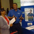 University of Arkansas Junior Anastasia Lofton from Fayetteville, talks with Carl Propps with the Ar...
