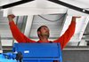 James Phillips with Multi-Craft Construction finished putting up the ceiling on the awning covering the bleachers at Veterans Park in Rogers on Wednesday. 