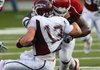 Akansas defensive tackle Malcolm Sheppard, shown sacking Missouri State quarterback Cody Kirby in season opener Sept. 5, will be one of five Georgia natives playing for the Razorbacks when they host Georgia on Saturday.