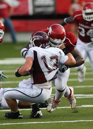 Akansas defensive tackle Malcolm Sheppard, shown sacking Missouri State quarterback Cody Kirby in season opener Sept. 5, will be one of five Georgia natives playing for the Razorbacks when they host Georgia on Saturday.
