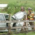 <b>Accident leads to fire</b>
Fayetteville Fire Capt. Trent North, left, and firefighter Clayton Ki...
