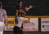 Prairie Grove junior receiver Charles Stills (15) catches a touchdown pass as Cassville (Mo.) junior defensive back Trevor Shumaker (28) defends in the third quarter Sept. 11 in Prairie Grove. The Tigers lost 39-13.