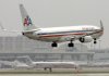 An American Airlines plane lands at one of its hubs, Dallas-Fort Worth International Airport, in October 2008.