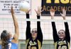 Bentonville's Melissa Bakke, left, and Sydney Thurow blocked an attack by Fort Smith Southside's Brooke Hale during Thursday's match at Bentonville High School. 