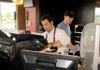 Silver Joe's Coffee Co. general manager Kurt Watson, left, and co-owner Terry Smith held a soft opening Thursday to start dealing with real customers - there were a lot of them - at the coffee house at 3351 Pinnacle Hills Parkway in Rogers. A grand opening will be held today. 