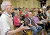 Carl Dahl finally got around to his question to U.S. Rep. John Boozman with the urging of an irritated crowd during a town-hall meeting at Riordan Hall in Bella Vista on Friday.