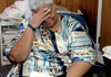 Hattie Daniels, a co-chairman of ACORN Arkansas, tears up as she talks about several projects her organization has carried out to benefit low- and moderate-income people in Arkansas.