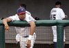 The Northwest Arkansas Naturals' Jose Duarte watches as the
Midland RockHounds celebrate a Texas League championship
at Arvest Ballpark after a 4-2, 12-inning victory Saturday.