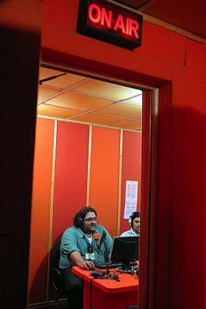 Fasi Zaka, talking with callers at his studio in Islamabad, says
Pakistanis need a laugh to cope with the pains of daily life.