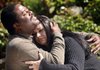 David Williams and his wife, Janeane Ardiel, embrace at a neutral
spot inside the Peace Arch International Park at Blaine, Wash.,
on the Canadian border.