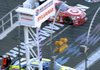 Mark Martin (5) holds off Juan Pablo Montoya to win Sunday in New Hampshire. Denny Hamlin also passed Montoya to finish second.