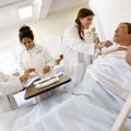 Nursing students Alison Lyon (from left), Josy Cash and Grace Adams practice working with a tracheos...