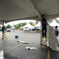 <b>Ready for the rumbling</b>
Workers with Intents Party Rentals in Fayetteville, from left, Lee St...