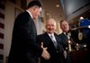 Michael Dell, chief executive officer of Dell Inc., and Ross Perot Sr., chairman emeritus of Perot Systems, shake hands Monday after announcing Dell's acquisition of Perot Systems for $3.9 billion in this photo provided by Perot Systems.