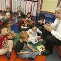 Rogers Mayor Steve Womack (right) talks with the students in Dana Nance's and Tara Kuhlman's class a...