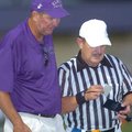 Elkins head coach Aaron Clark talks to a referee during the first half of a game against Pea Ridge, ...