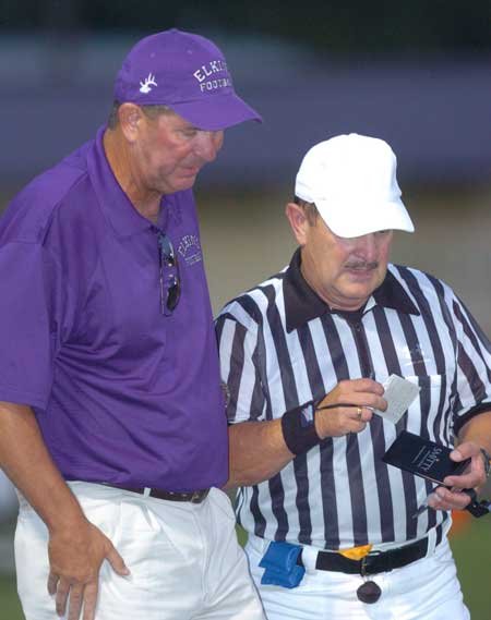 Elkins head coach Aaron Clark ...