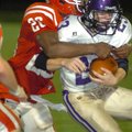 Farmington sophomore Deon Clay (26) tackles an Ozark player Friday, Sept. 11, during the first half ...
