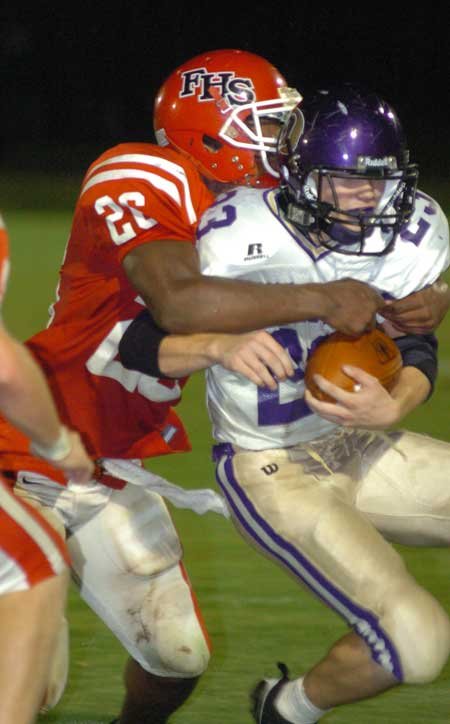 Farmington sophomore Deon Clay (26) ...