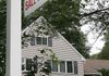 A sale is pending on this home Sept. 11 in Wayland, Mass. A government index shows home prices rose slightly in July.