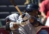 Robinson Cano, the New York second baseman, watches his tworun, fourth-inning single against Los Angeles in the Yankees' 3-2 victory over the Angels on Wednesday in Anaheim, Calif.
