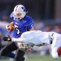 Woodland Junior High tight end Brooks Ellis (5) fends off George Junior High safety Jesus Conteno du...
