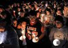 Family, friends and Gravette High School students came out to pay their respects Wednesday evening at a candlelight vigil for Gravette football player Casey Russell, who died early Wednesday morning.

