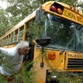 <b>School bus mishap</b>
Farmington School District Superintendent Ron Wright examines a bus that r...
