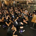 Fayetteville coach Daryl Patton speaks to his team prior to the start of the Dogs' walk-through prac...