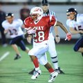 Ramay Junior High running back Brice Gahagans (28) heads for the end zone through the Rogers Heritag...