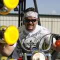 Chuck Ames of Rogers runs his motorcycle on the Geico Dyno Drag at Pig Trail Harley Davidson in Roge...