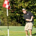 Bentonville's Ben Sullivan chipped onto the green at the second hole Friday at Bella Vista Country C...