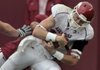 Arkansas quarterback Ryan Mallett is sacked by Alabama's Eryk Anders during the first quarter of the Hogs' 35-7 loss to Alabama in Tuscaloosa, Ala., at Bryant-Denny Stadium.