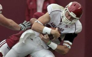 Arkansas quarterback Ryan Mallett is sacked by Alabama's Eryk Anders during the first quarter of the Hogs' 35-7 loss to Alabama in Tuscaloosa, Ala., at Bryant-Denny Stadium.