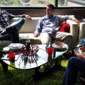 Creative director Joey Nelson of Fayetteville, left, director of technology John Cox of Rogers and s...