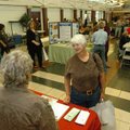 <h3>Health fair</h3>
Sally Bewley talks with people from the University of Arkansas nutrition progr...
