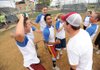 Vik Dudheker, center, and the rest of the members of Papa Smurf and the 9 Dwarfs celebrate their 4-1 win over the Brew Dogs Sept. 20 at the Randal Tyson Sports Complex in Springdale. 

